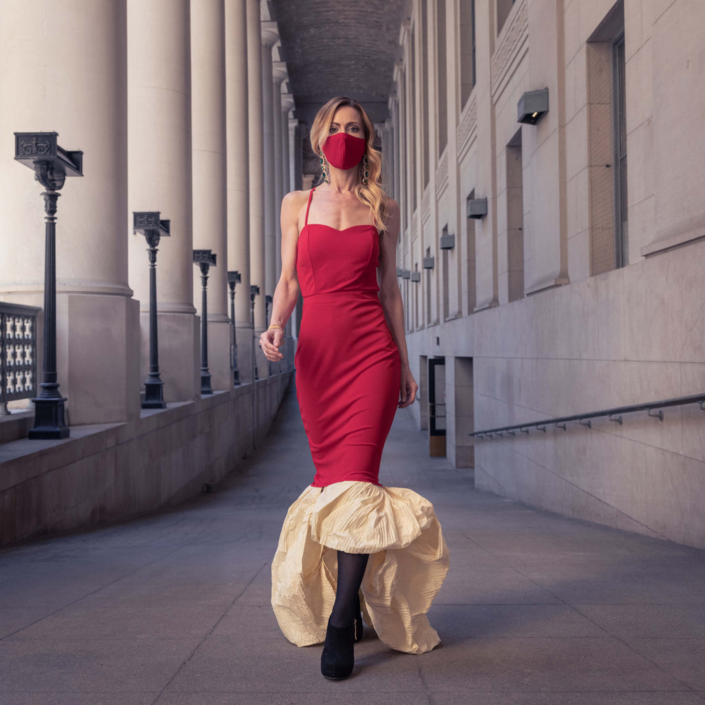 Demascare – Toronto - Upcycled red poly crepe halter dress. Altered from short A-line to form fitting silhouette, with addition of draped bubble hem made with pleated paper.