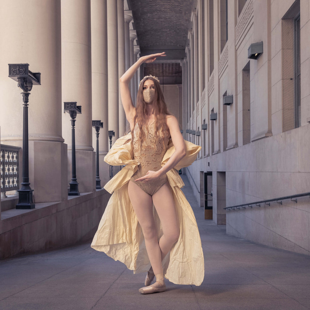 Demascare – Toronto - Upcycled ballet bodysuit draped in gold jacquard dégradé , with a three tier asymmetric sculpted paper drape enveloping the waist.
